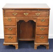 Georgian mahogany twin pedestal desk with brush slide, eight drawers and central cupboard, W84 x D48