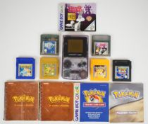 Nintendo Gameboy Color handheld console with six games comprising The Legend of Zelda Oracle of