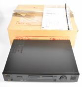 Nakamichi DVD-10S, region 2 DVD player, in original box with remote control and instruction manual.
