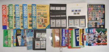 Stamps and philatelic literature including shoebox of packets of Commonwealth stamps with Rhodesia