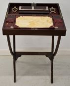 19thC mahogany folding campaign desk with fitted leather interior and ivorine plaque 'Best London