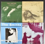 Smiths collection of three LPs and four 12