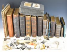 Ten Victorian leather bound photograph albums, all empty, some with colour illustrated surrounds