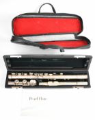 Romilly Coronet hallmarked silver flute, made for Rudall Carte & Co Ltd. hallmarked Boosey &