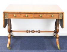 Regency inlaid, crossbanded and brass / ormolu decorated two drawer rosewood sofa table with lyre