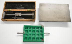 Two small cast iron surface plates or marking out tables and a cased NSF height gauge