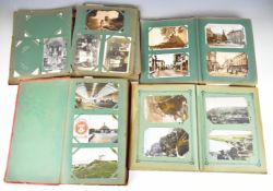 Collection of approximately six hundred Edwardian and early 20th century postcards housed in four