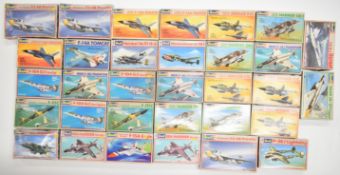Thirty two Revell 1:144 scale plastic model military aircraft kits to include General Dynamics F-