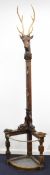 19thC Black Forest carved oak zoomorphic corner hall stand, the carved deer finial with genuine