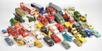 A collection of vintage Dinky Toys diecast model cars, trucks and military vehicles to include