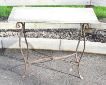 Three marble topped wrought and cast iron garden tables, largest width 84cm