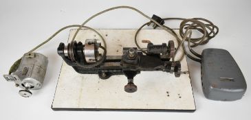 Super Adept watchmaker's or model maker's lathe with four jaw chuck, electric motor and foot