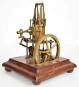 Live steam James Coombs table engine with brass cylinder and base, turned steel columns and twin