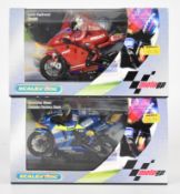 Two Scalextric Moto GP racing bikes comprising Valentino Rossi Yamaha Factory Team C6020 and Loris