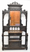 19thC carved oak mirror backed hall stand, W122 x D42 x H230cm