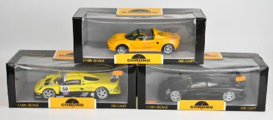 Three Chrono 1:18 scale diecast model Lotus Elise sport/racing cars, all in original display boxes.