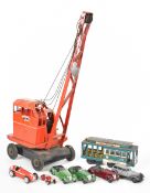 A group of vintage transport and construction related toys to include early Dinky examples, a