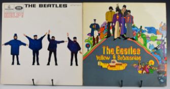 Three Beatles LPs, all early 'yellow Parlophone' label UK presses. Help! (PMC 1255) triple flip back