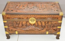 Chinese carved metal bound camphor wood chest, W94 x D45 x H55cm