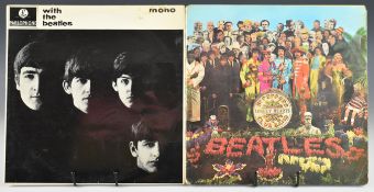 Three LPs. Pink Floyd Dark Side of the Moon (USA pressing). The Beatles Sgt Pepper's Lonely Hearts