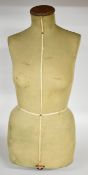 Singer tailor's mannequin or dummy with applied name badge to lower edge, overall height 84cm