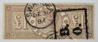 1884 £1 brown lilac stamp with watermark crowns (SG185) cancelled with Swansea circular date stamp