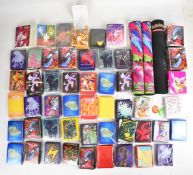 Pokémon TCG - A collection of archival supplies and gaming accessories including card sleeves, boxes
