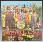 The Beatles Sgt. Pepper's Lonely Hearts Club Band Nimbus Supercut LP (Parlophone PCS 7027) in open