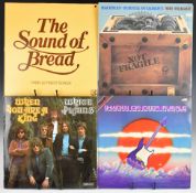 Eighteen Rock / Prog Rock / Folk / Heavy Rock LPs in an orange Psychedelic / Flower Power period