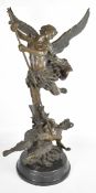Large bronze figure of Archangel Michael vanquishing the devil / Lucifer, raised on a circular base,