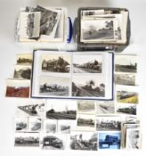 Approximately 1000 Great Western Railway and similar photographs and postcards, housed in two