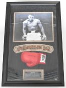 Muhammad Ali signed Everlast red boxing glove, mounted in box frame with large photograph of the