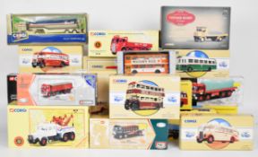 Twenty Corgi diecast model buses and haulage vehicles, all in original boxes.