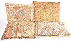 Four North African style embroidery cushions, 40 x 51cm