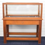 Glazed display case on stand with wooden frame and base, to suit live steam locomotive, traction