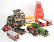 Hornby Trains 0 gauge model railway items comprising two clockwork tank locomotives, goods wagons