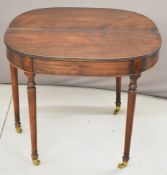 19thC mahogany fold over games / card table raised on brass castors, W88 x D43 x H74cm