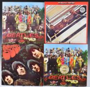 Four Beatles LPs comprising Sgt Pepper's Lonely Hearts Club Band (PCS 7027) stereo half speed