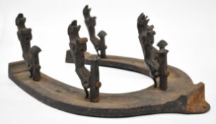 Jaguar motor car interest coat rack formed as a horseshoe mounted with five leaping jaguar car