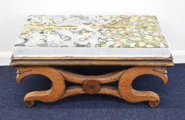 19thC mahogany upholstered footstool with scrolling X frame decoration, W87 x D50 x H40cm