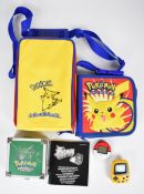 Pokémon related gaming items to include Pocket Pikachu and a Nintendo DS Pokéwalker.