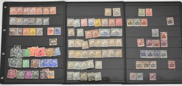 German Colony stamps on stock pages, including British Occupation Cameroun 1915 with mint values