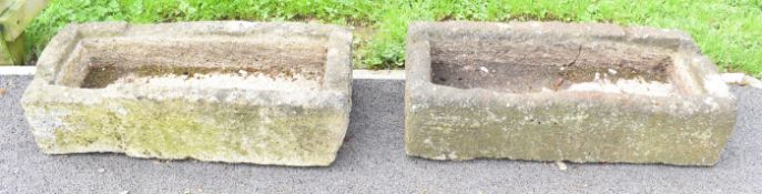 Two natural stone garden troughs with drainage holes, largest W92 x D39 x H25cm