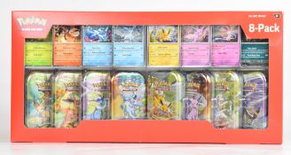 Pokémon TCG - Scarlet & Violet 'Prismatic Evolutions' mini tin 8-pack, each containing two boosters,
