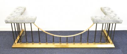 Upholstered brass club fender, W170 x D58 x H73cm Provenance: Consigned by a direct descendant of