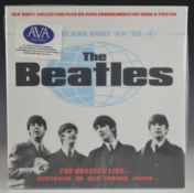 The Beatles Home And Away box set containing five vinyl LPs, 60 page hardback commemorative book and