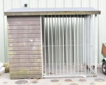 Outdoor dog kennel having wooden shed portion and galvanised cage, with recently re felted roof,