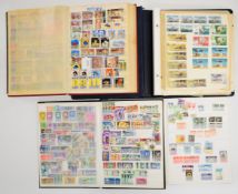 Collection of Commonwealth stamps in one album and three stock albums including Nigeria, South