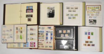Channel Islands including Alderney and Isle of Man stamp collections in printed hingeless albums,