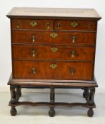 William and Mary inlaid walnut and quarter veneered chest on stand of two over three graduated